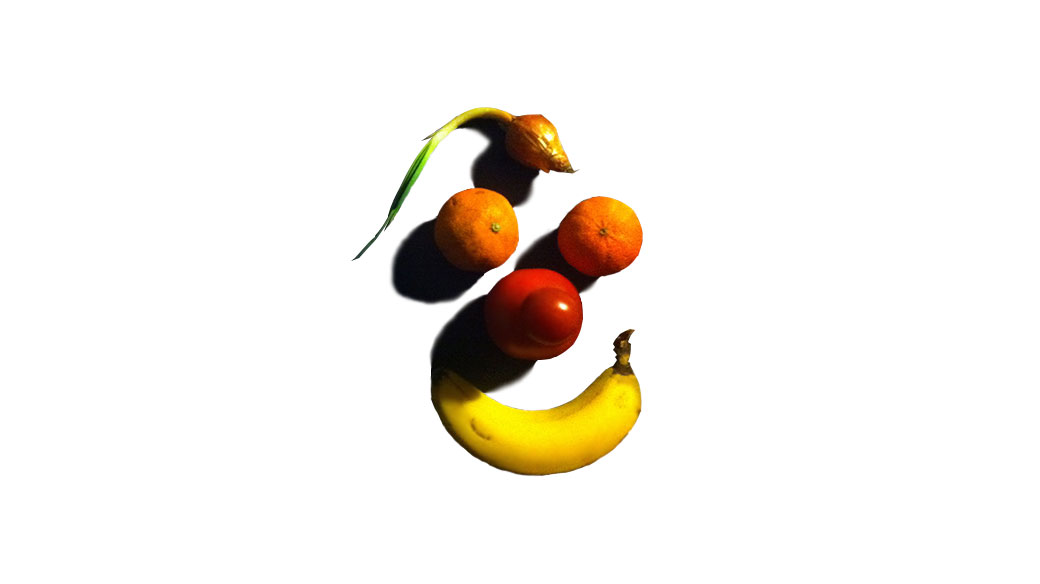Verschiedene Früchte und Gemüse machen das Logo der RestEssBar: Banane als Mund, Tomate als Nase, Mandarinen als Augen und Zwiebel als Frisur!